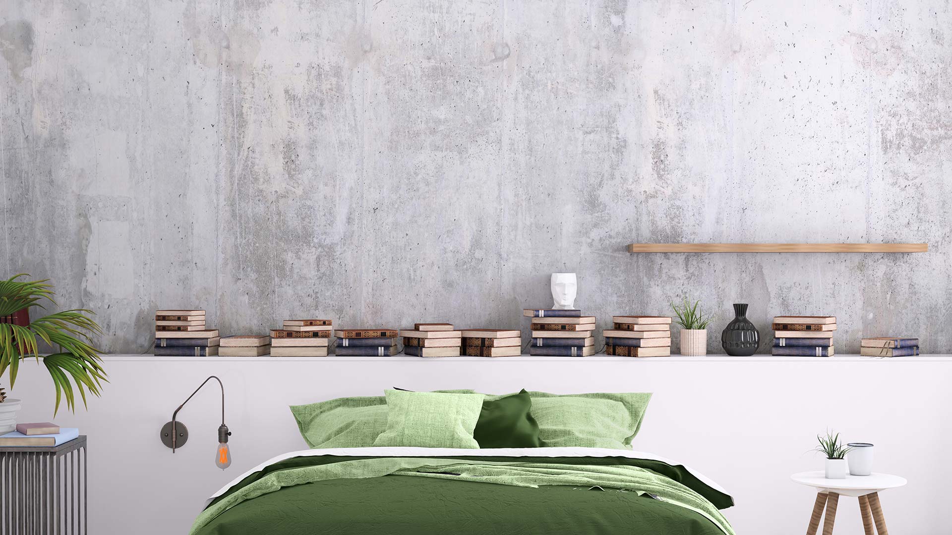 Ett sovrum med gråa väggar i microcement